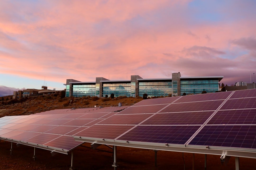 solar-panels-on-brown-field-under-white-clouds-during-daytime-ngdhrwax0j8